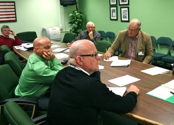 Committee interviews football coach finalists